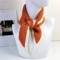 Knitted winter triangle scarf in bright orange and cream color block design for women - Orange