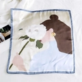 Silk square scarf featuring vintage portrait print with large white flower and blue border - 31 Jasmine Girl