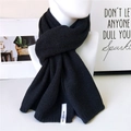 Classic black knitted winter scarf with a stylish brand label for cold weather warmth - Crystal Labeled Black