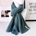 Solid dark green chunky knit scarf for winter with a minimalist white woven logo label - Crystal Labeled Lake Blue