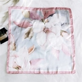 Square silk scarf featuring soft pink borders and elegant magnolia floral digital print - 33 Fruit Pink Border