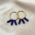 Golden hoop earrings with dark blue faceted beads and high-quality metallic shine - Dark Blue