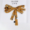 Mustard yellow polyester scarf with blue swallow print on minimalist white slow life card - Bird Yellow