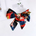 Macro detail of narrow silk scarf with vibrant abstract print and premium satin texture - Sun Oil Painting Style