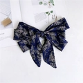 Close-up of a dark blue paisley pattern satin ribbon scarf tied in a bow with floral details - Navy Blue Paisley