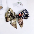 Vintage newspaper print hair ribbon with British flag pattern and textile label - Flag Newspaper