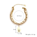 Mehrlagiges Perlenarmband mit 18k Gold Hamsa-Hand-Anhänger aus rostfreiem Edelstahl - Dreilagiges Hand-Perlenarmband