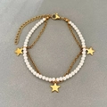 Double-layer stainless steel bracelet with white pearls and three gold star pendants - Star Style