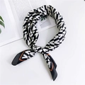 Elegant geometric V-pattern silk scarf in black and white with orange border detail - Black V Letter