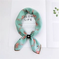 Mint green narrow scarf with orange geometric patterns and a black metal buckle - Geometric Bird Light Green