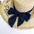 Sombrero de paja con gran lazo de seda azul marino y diseño de borde con flecos - Azul marino