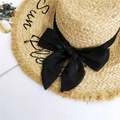 Sombrero de paja beige con bordado Sun Please negro y detalle de lazo de seda - Negro