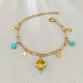 Bracciale a catena dorata con perle di turchese, stelle marine e ciondolo a conchiglia - Verde