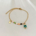Bracciale in acciaio dorato con conchiglia turchese, stelle e perline colorate - Verde
