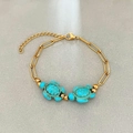 Bracciale a catena a graffetta dorata con tartarughe in turchese blu e chiusura regolabile - Tartaruga marina