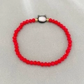 Elastic red beaded bracelet with mother-of-pearl cat pendant and gold spacer beads - Bracelet / Red/Dark Grey Cat Bracelet