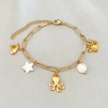 Golden ocean charm bracelet featuring octopus, crab, fish pendants and pearl details - Octopus and Crab Charm Style (Style 3)