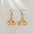 Goldene Ohrhänger mit orangefarbenen Kristallperlen im stilvollen Kirsch-Design für Damen - Gold-Rosérot