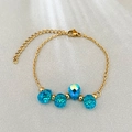 Golden chain bracelet with blue teardrop crystals and adjustable lobster clasp closure - Blue AB