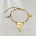 Pulsera de cadena de clip dorada con colgante de corazón y cuenta de porcelana azul - Estilo Corazón