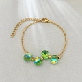Golden 18k bracelet featuring green and blue gradient faceted crystal teardrop beads - Green AB Color