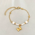 Elegant gold beaded chain bracelet featuring white pearls and a polished butterfly charm - Bowknot Style