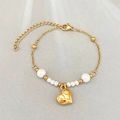Gold beaded bracelet featuring white pearls and a heart-shaped engraved pendant charm - Couple Heart Style