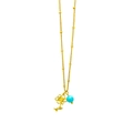 Minimalist gold floral necklace featuring a blue turquoise pendant on a bead chain - Flower 7