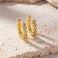 Close-up of gold geometric hoop earrings with sparkling pavé cubic zirconia inlay - Geometric Hollow Rhinestone