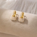 Elegant gold square drop earrings encrusted with micro pearls on a textured background - Square Pave Pearl Style (A)