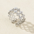 Detail of silver adjustable open ring with hollow flower design and zircon pearls - Silver Hollow Floral Pearl Style (Style F)