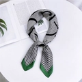 Elegant houndstooth silk scarf with dark green border and abstract lines displayed on table - 70cm / 1 Green Note Edge