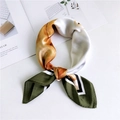 Green and orange patterned silk scarf tied in a loop over a minimalist art book - 9 White Cat and Window Green Border