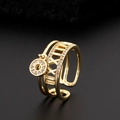 Macro detail of gold layered ring with Roman numerals and micro-set zircon stones - Roman Numerals Hollow Round Pendant Style (5)
