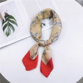 Elegant silk scarf featuring champagne and red zebra print tied in a stylish knot - Small Zebra Khaki Red