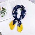 Square silk scarf with navy zebra print and bright yellow borders on white surface - Small Zebra Navy Yellow