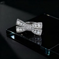 Elegant bow-shaped ring with pearls and pavé diamonds on a sleek black surface - Bowknot Pearl Style / Silver Bowknot Pearl Style (A)