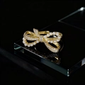 Macro detail of golden bow ring with white pearls and sparkling pavé crystals - Asymmetric Bowknot Pearl Style / Gold Asymmetric Bowknot Pearl Style (C)