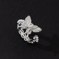 Macro detail of silver butterfly ring featuring sparkling diamonds and elegant white pearls - Silver Butterfly Chain Pearl Style (F)