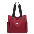 Minimalist burgundy Oxford fabric tote bag with black straps and side pockets - Red