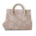 Beige canvas vierkante handtas met witte bloemen in reliëf en een verstelbare riem - Khaki