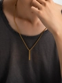 Close-up of golden rectangular bar pendant necklace on person for minimalist style - 18K Gold / Gold