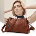 Sac bandoulière marron en similicuir avec poches zippées et bandoulière en tissu tressé - Marron