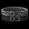 Men's silver Franco link chain bracelet with matte black square clasp on black reflective surface - Black