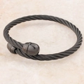 Black PVD stainless steel twisted cable bracelet with open bypass design and hemisphere caps - Black