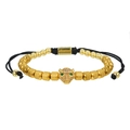 Dettaglio del bracciale con testa di leopardo dorata, zirconi verdi e corda intrecciata - Oro Zircone Bianco