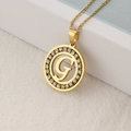 Golden stainless steel letter G necklace with sparkling round crystal paving - Letter G