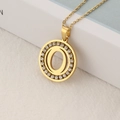 Golden stainless steel necklace featuring a crystal-encrusted round letter O pendant - Letter O
