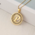 Golden stainless steel necklace featuring a round pavé-set pendant with hollow letter P - Letter P