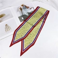 Detail view of a light green floral silk twilly scarf with elegant pointed ends and stripes - 86cm / Floral Yellow Red